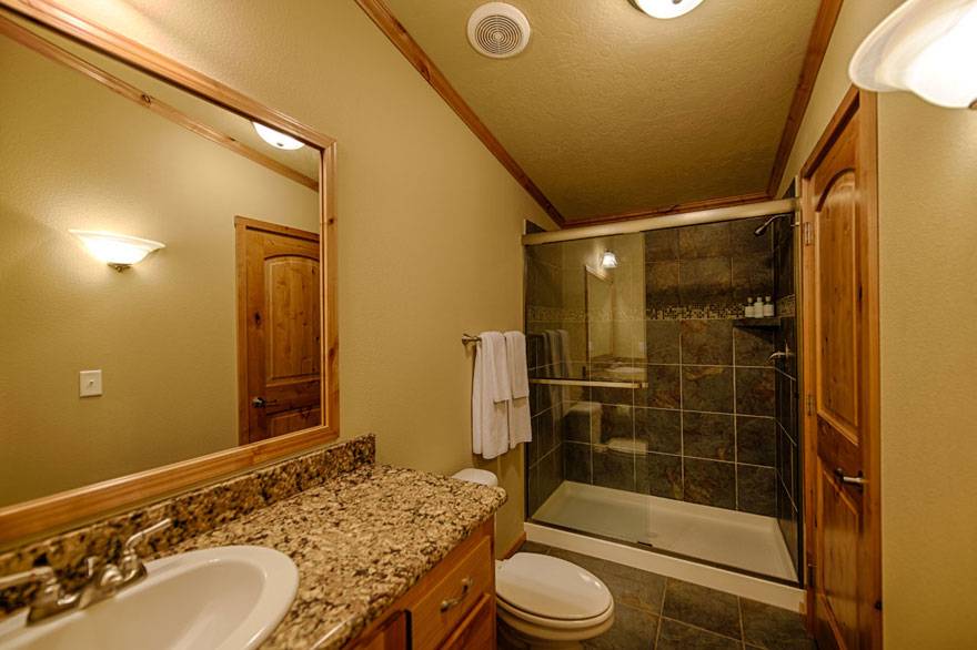 Enjoy a private bathroom with granite counters in every Explorer Cabin.