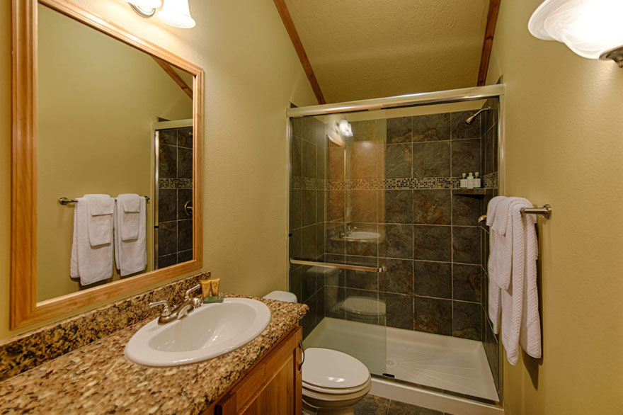 Enjoy a private bathroom with granite counters in every Explorer Cabin.