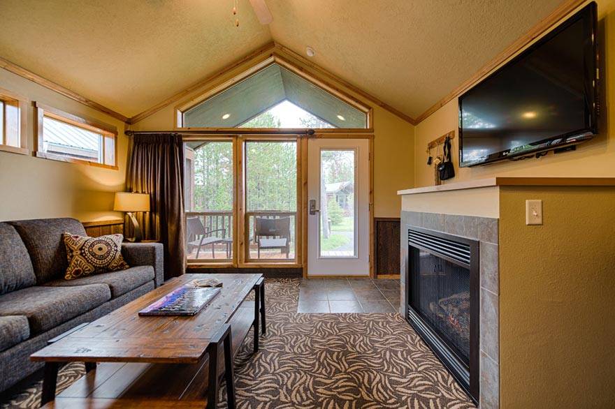 Relax after a day of adventure in your own private living room with flat screen TV, fireplace, and more.