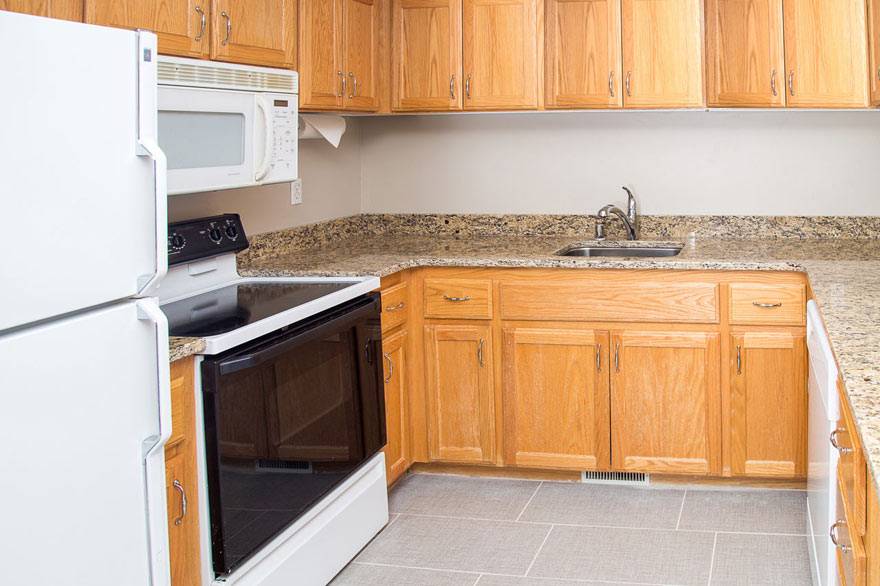 The Gray Wolf Inn and Suites family suite features a full size kitchen with plenty of room.