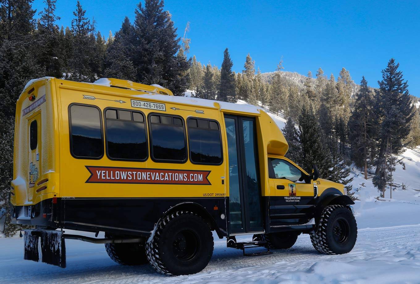 A Yellowstone Vacations snowcoach in Yellowstone National Park