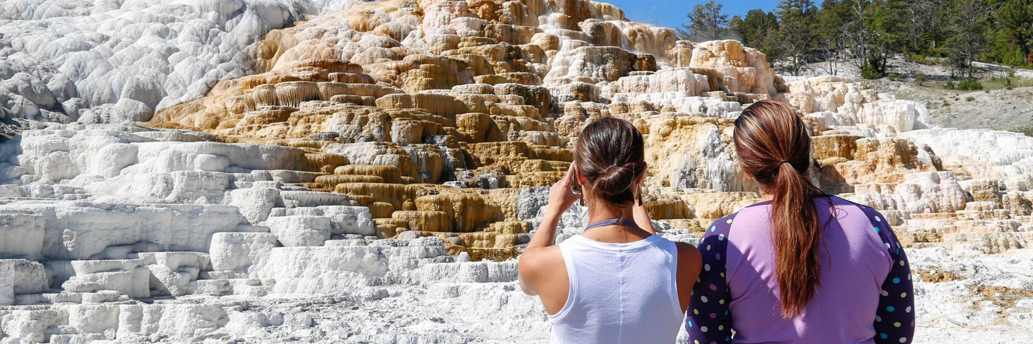 Two Yellowstone visitors at Mammoth Hot Springs