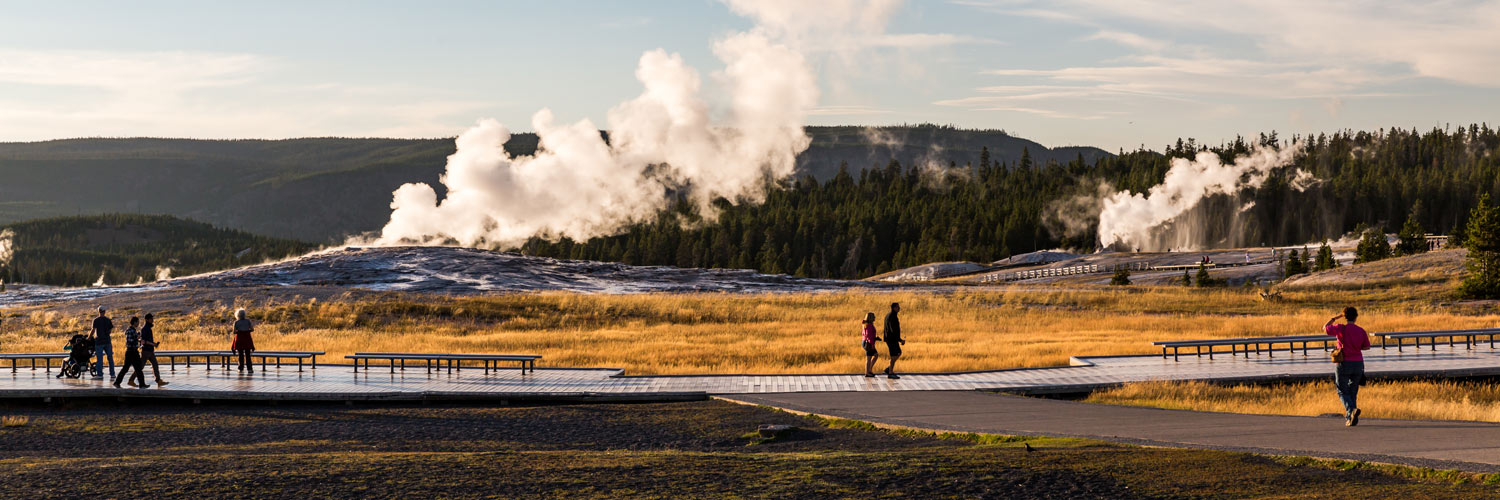Old Faithful geyser in fall