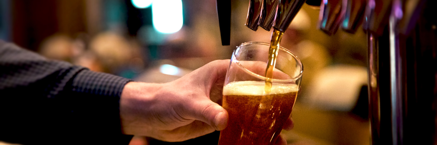 Pouring beer at the Yellowstone Mine Restaurant at Best Western by Mammoth Hot Springs