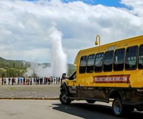 A fall bus tour to Old Faithful geyser