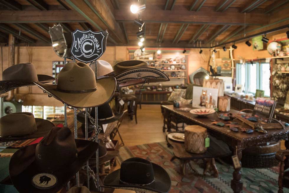 A display of cowboy hats inside Yellowstone General Store