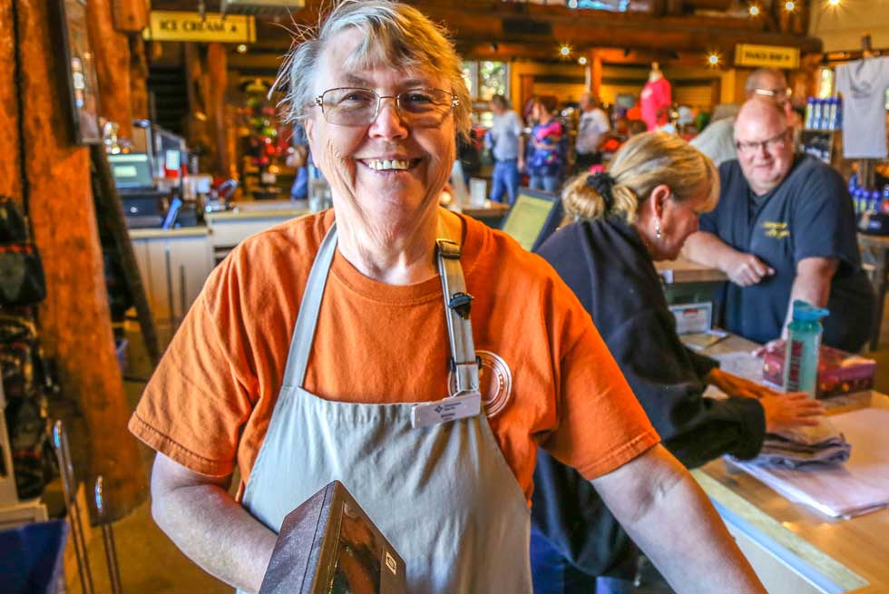 Happy cashier employee at Yellowstone General Store
