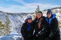 Girls posing at the Grand Canyon of the Yellowstone in winter