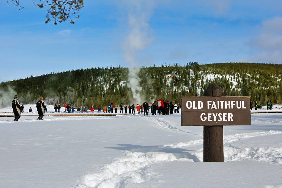 Yellowstone snowmobile group at Old Faithful