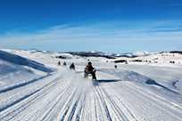 Snowmobile riders in Yellowstone National Park