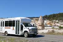 A Yellowstone Vacation Tours bus at Mammoth Hot Springs